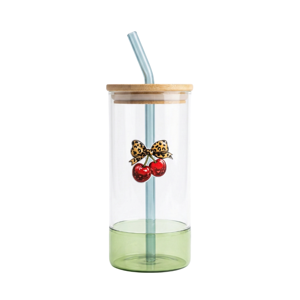 Green shaded glass tumbler with a printed cherry bow design, Bamboo lid and glass straw